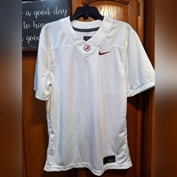 A Nike Dri-Fit Alabama #4 Milroe jersey in a mens size small. NWT - Picture 1 of 10